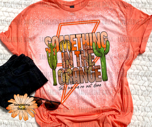 "Something in the Orange" Soft Style TShirt Vibrant and Over-sized Design Bleached & Sublimated